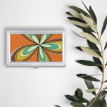 Porte-cartes De Visite Années 60 super les années 70 Hippie Fleur Orange<br><div class="desc">Ce design orange et rétro présente un kaléidoscope de tons chauds et terreux qui incarnent l'essence des années 60 et les années 70, vous invitant à découvrir un monde qui n'est rien de moins que super. Il présente un motif hypnotique, d’inspiration fleurie, qui rayonne vers l’extérieur dans un spectacle éblouissant...</div>
