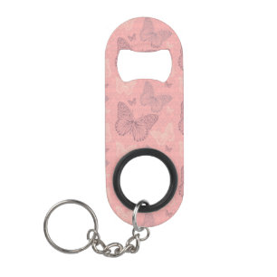 Porte-clé Décapsuleur Le rose de papillon