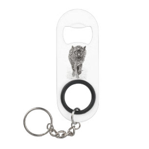 Porte-clé Décapsuleur Loup noir en colère dans la neige, hiver sauvage
