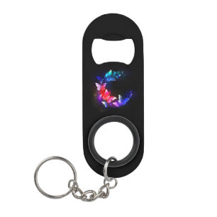Porte-clé Décapsuleur Papillons néon brillants la nuit sur fond noir