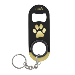 Porte-clé Décapsuleur Paw chien brillant or sur arrière - plan noir