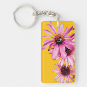 Porte-clefs Abeille, sur fleurs roses