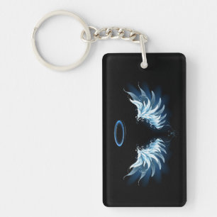 Porte-clefs Ailes d'ange bleues lumineuses sur fond noir