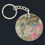Porte-clefs Alice Cheshire Chat Wonderland Tree Garden<br><div class="desc">C'est le classique Alice au pays des merveilles et le Cheshire Cat, comme Alice conversation avec le Cheshire Cat qui est assis dans son arbre. Cette image Alice in Wonderland est basée sur l'image originale Cheshire Cat de la série originale Alice's Adventures in Wonderland de l'illustrateur John Tenniel, rassemblée dans...</div>