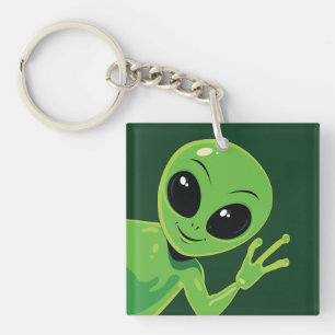 Porte-clefs Alien vert qui fait signe de la main, dessin animé