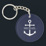 Porte-clefs Ancre bleue marine personnalisée avec nom<br><div class="desc">Ce cadeau personnalisé présente un design d'ancre blanc avec un nom personnalisé dans une police serif blanche classique sur fond bleu marine. Une idée de cadeau nautique attentionné pour la décoration de la maison de plage, un cadeau pour la fête des pères pour papa, un cadeau de remerciement pour les...</div>