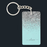 Porte-clefs Aqua bleu Turquoise Parties scintillant argent Mon<br><div class="desc">Aqua Blue - Turquoise et Silver Sparkle Parties scintillant Script Monogramme Nom Porte - clé. Cela rend le cadeau parfait pour 16 ans,  mariage,  douche nuptiale,  anniversaire,  baby shower ou bachelorette pour quelqu'un qui aime le luxe glam et les styles chic.</div>