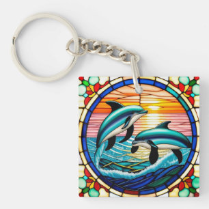Porte-clefs Art de verre coloré avec des dauphins bondissant a
