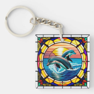 Porte-clefs Art de verre coloré avec des dauphins bondissant a