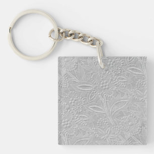 Porte-clefs Aspect floral embossé gris
