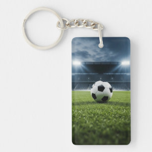 Porte-clefs Bal de soccer sur terrain en herbe sous les lumièr