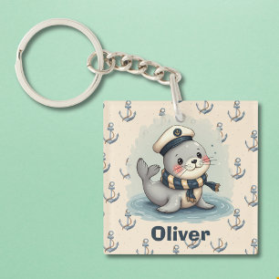 Porte-clefs Bébé phoque mignon avec chapeau et écharpe de mari
