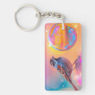 Porte-clefs Bruant coloré et bulle arc-en-ciel