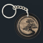 Porte-clefs Cercle de zen d'Enso et or d'arbre de bonsaïs<br><div class="desc">Cercle de zen d'Enso et or d'arbre de bonsaïs</div>