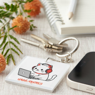 Porte-clefs Chat Blanc Mignon avec Casque Rouge sur Ordinateur