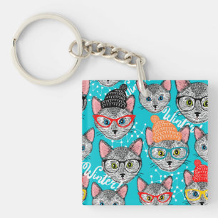 Porte-clefs Chat dans le casquette