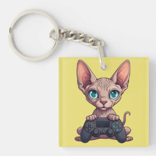 Porte-clefs Chat Sphynx tenant une manette de jeu