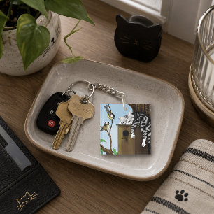 Porte-clefs Chat tigré mignon dormant dans une maison d'oiseau
