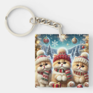 Porte-clefs Chats Kitty dans un décor festif de Noël et neige