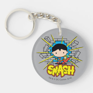 Porte-clefs Chibi Superman Frappant À Travers Un Mur De Brique