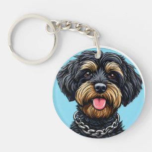 Porte-clefs Chien avec chaîne sur un arrière - plan bleu