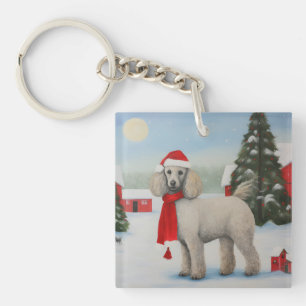 Porte-clefs Chien de caniche à Noël de neige