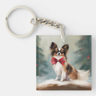 Porte-clefs Chien de Papillon à Noël de neige