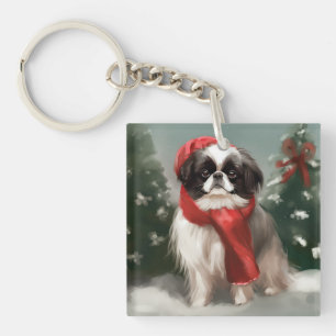 Porte-clefs Chien Japonais Chin dans la neige de Noël 