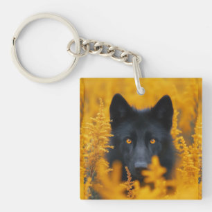 Porte-clefs Chien noir aux yeux d'or étonnants