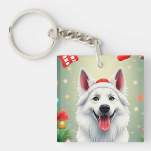 Porte-clefs Chien posant parmi les décorations de Noël festive