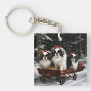 Porte-clefs Chin Japonais Traîneau enneigé Décor de Noël