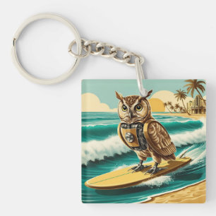 Porte-clefs Chouette robot vintage surfant sur la plage