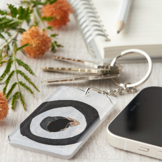 Porte-clefs cible déchirures