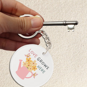 Porte-clefs Citation de jardin floral 'L'amour grandit ici'