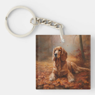 Porte-clefs Cocker Spaniel dans les feuilles d'automne qui tom