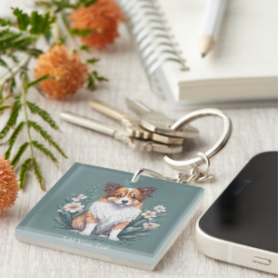Porte-clefs Collie mignon entouré de fleurs -