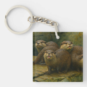 Porte-clefs Compagnie curieuse - Famille Otter sur les rochers