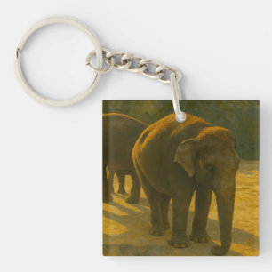 Porte-clefs Compagnons d'or - Trio d'éléphants à lumière chaud
