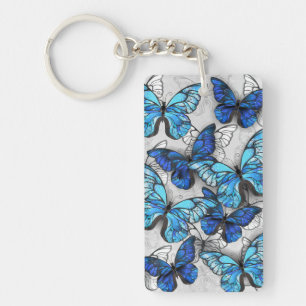 Porte-clefs Composition de papillons blancs et bleus