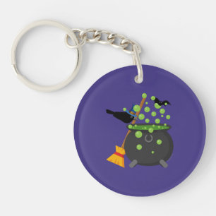 Porte-clefs Corbeau de sorcière regardant dans une cauldron bo
