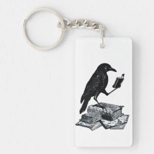 Porte-clefs Corbeau magique avec livres académiques