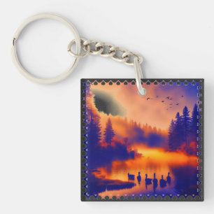 Porte-clefs Coucher de soleil orange coloré avec des canards s