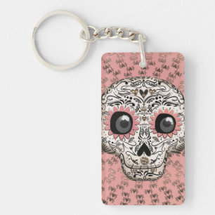 Porte-clefs Crâne en sucre rose et or et cœurs fantaisistes mi