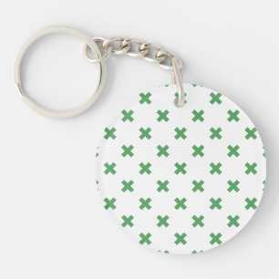 Porte-clefs Croix verte coutures sur blanc