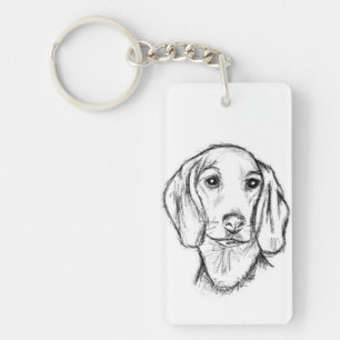 Porte-clefs croquis de teckel dessiné à la main en noir et bla