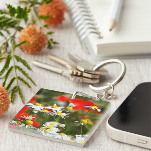 Porte-clefs Dans un champ de pavots être une marguerite