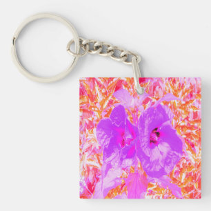 Porte-clefs Deux Hibiscus de prune violet et rose chaud sur ro