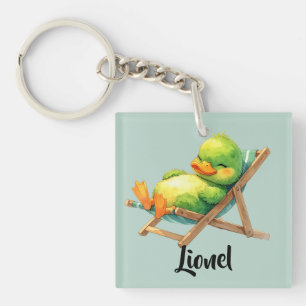 Porte-clefs Douce petite cane verte est allongée de manière dé