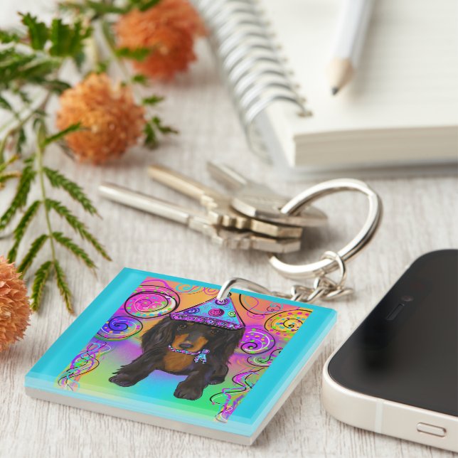 PORTE-CLEFS DOXIE NOIR À POILS LONGS    (Devant Droit)