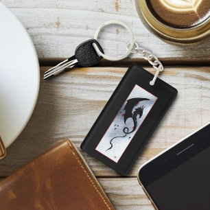 Porte-clefs Dragon tribal noir gras rouge et fleurs bleues